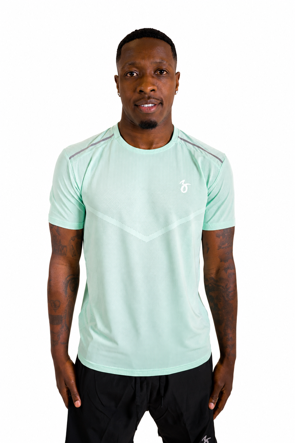 Man wearing a light green mint athletic shirt with 36 thirtysixers on a white background