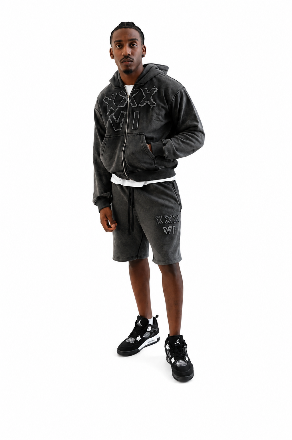 Man wearing acid gray hoodie and shorts set with xxxvi distressed 